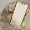 Cream and gold order of service