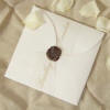Die cut flower envelope with wax seal and name detail wedding invitation